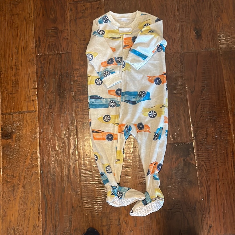 NWOT 
Carters footed pajamas size 12 months